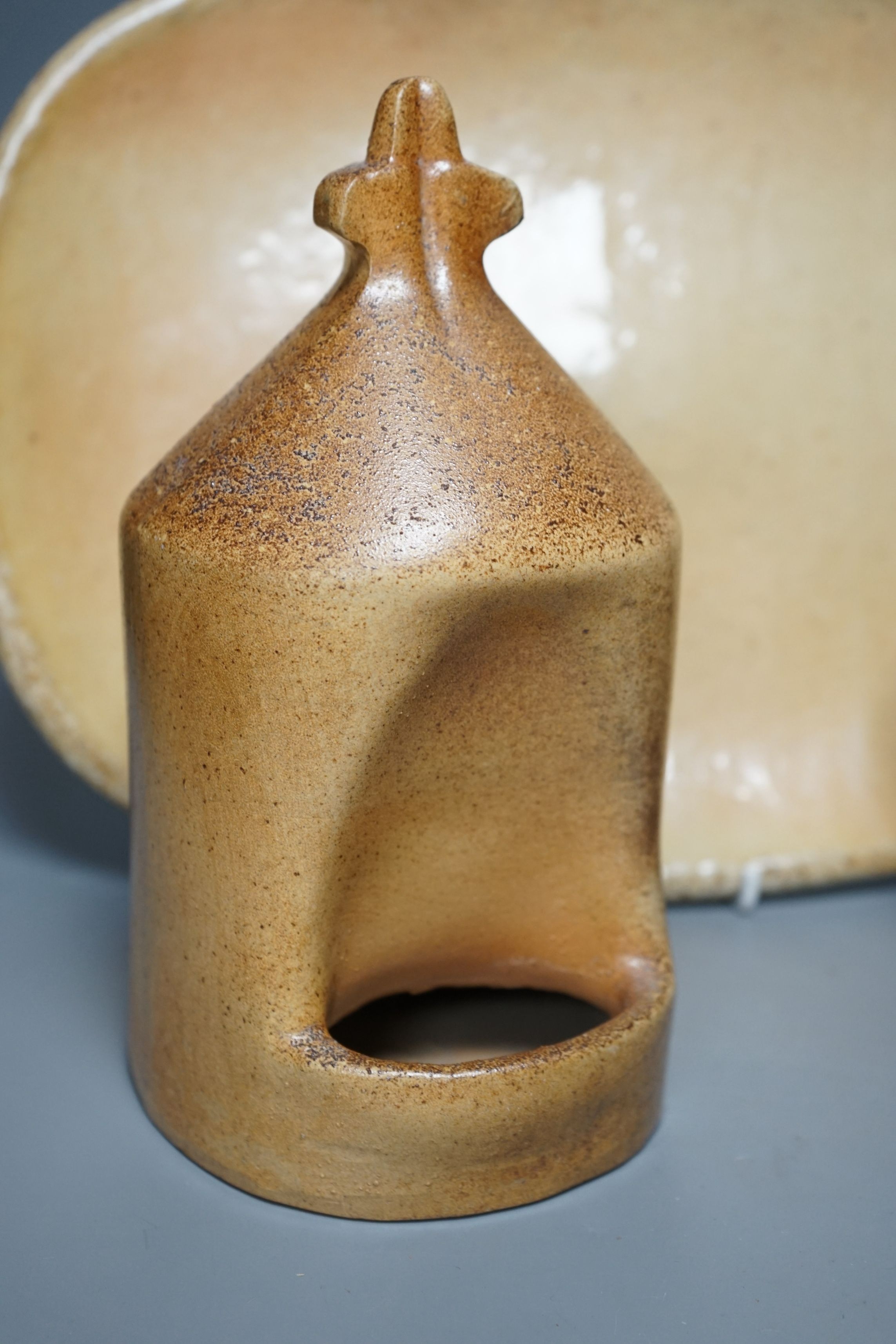 British studio pottery; a group to include a Micki Schloessingk (b.1949) salt glaze teapot and cover, together with other similar items and other studio pottery wares, largest 39cm wide, (5)